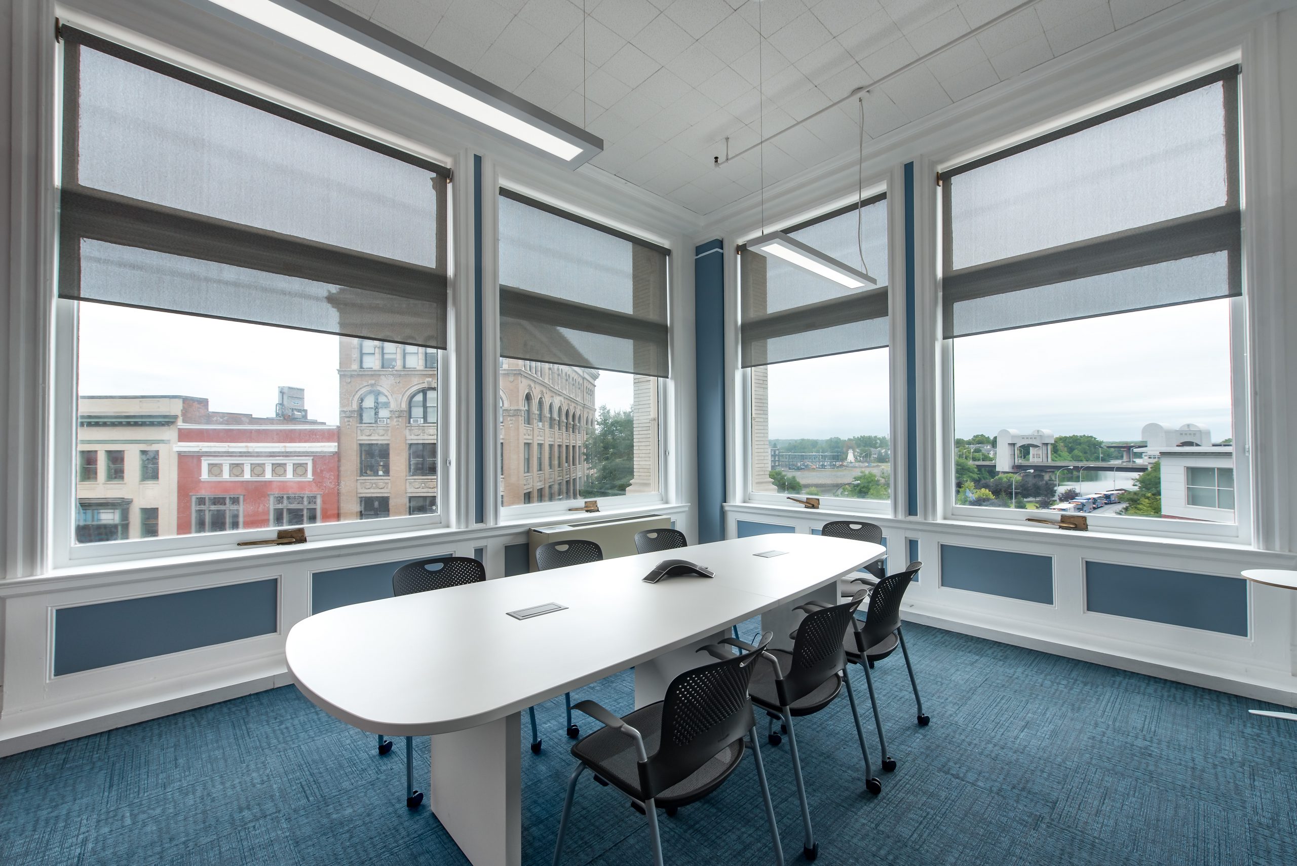 The Hudson Conference room, empty, with the windows facing downtown Troy.
